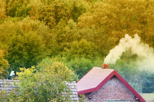 An image of moke coming out of chimney