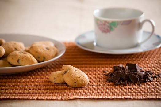 Cookies with chocolate chips on a tablecloth