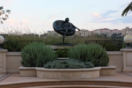 Sculpture - she leaned back in her chair. Black color