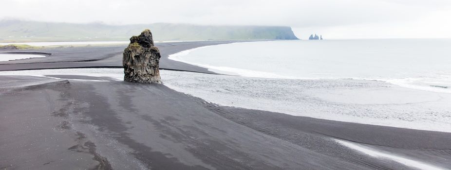 Big rock on the black beach near Vik, Iceland