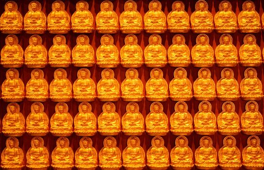 Buddha statue on the wall backgrond for Chinese new year