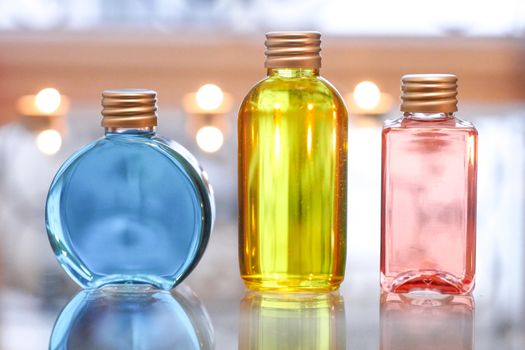 Perfume bottles Perfume bottles Blue Red and Yellow on a table