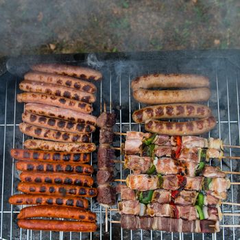 Barbecue grill with various kinds of meat, close-up.