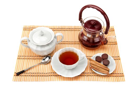 tea and tea utensils isolated on white background