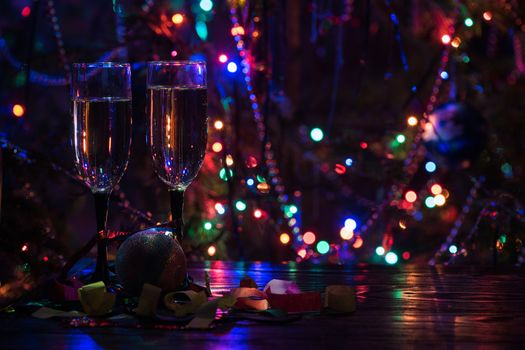 two shampagne glasses on celebratory table