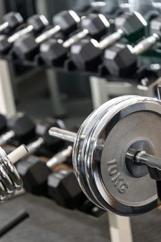 Dumbbells in a gym, sport concept