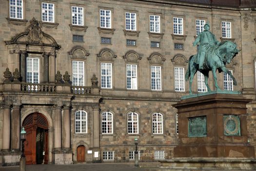 The equestrian statue of King Frederik VII in front of the Christiansborg Palace in Copenhagen, Denmark