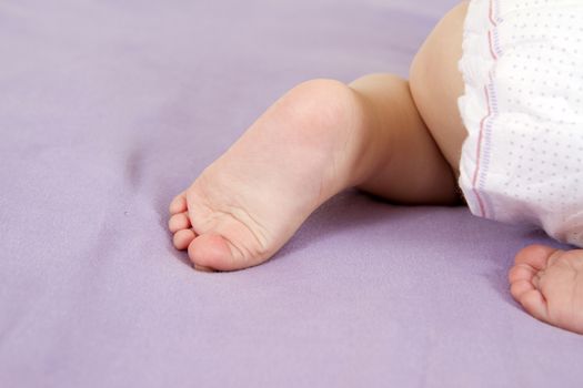 Infant foot;infantile foot;newborn closeup.