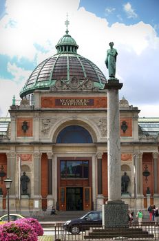 COPENHAGEN, DENMARK - AUGUST 14, 2016:  Art museum in Copenhagen Ny Carlsberg Glyptotek building and column. The art museum was inaugurated in 1906. in Copenhagen, Denmark on August 14, 2016.