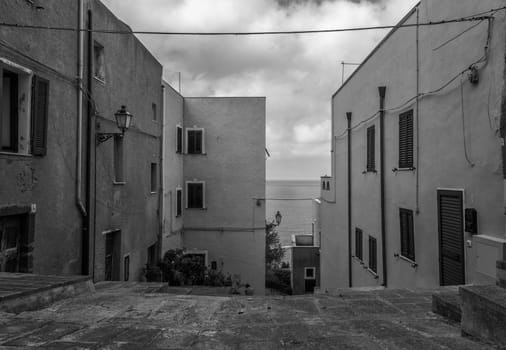 the beautiful alley of castelsardo old city - sardinia - italy