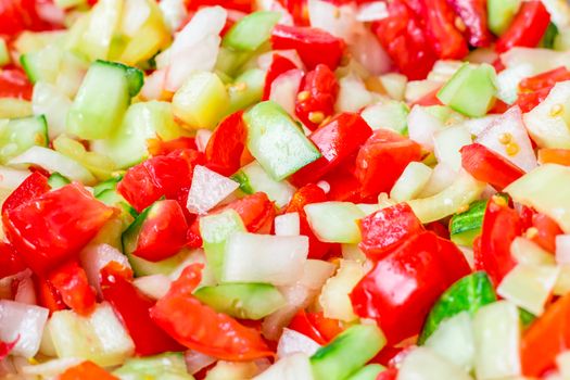 Vegetable salad mix of fresh sliced tomatoes, onions, peppers and cucumbers