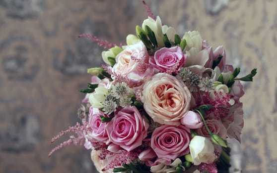 Beautiful wedding bouquet from pink roses