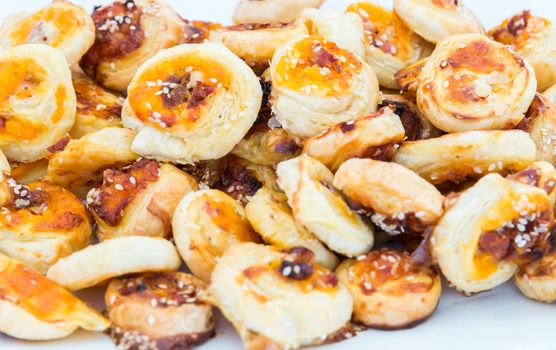 the cookies of puff pastry with sesame seeds