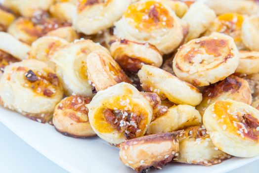 the cookies of puff pastry with sesame seeds