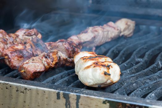 the juicy hot shish kebab on the grill