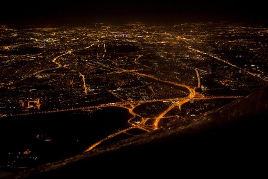 Night view of the city of Moscow from a flying airplane.