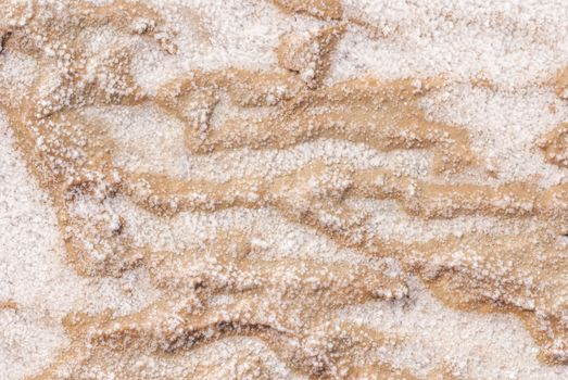 Dry salt lake bottom full of texture.The cracks form a distinctive lightning like pattern.