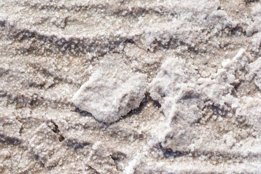 Dry salt lake bottom full of texture.The cracks form a distinctive lightning like pattern.