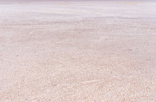 Dry salt lake bottom full of texture.The cracks form a distinctive lightning like pattern.