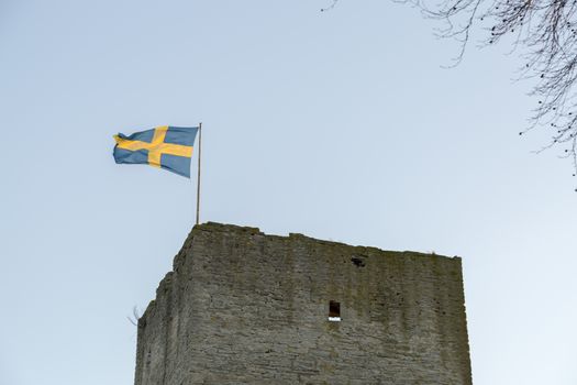 Swedish Flag on Visby Town Wall in Gotland, Sweden.