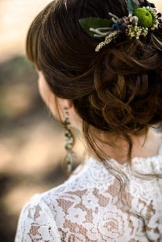 bride hair back, twisted twisted curls with flowers