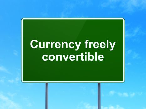 Money concept: Currency freely Convertible on green road highway sign, clear blue sky background, 3D rendering