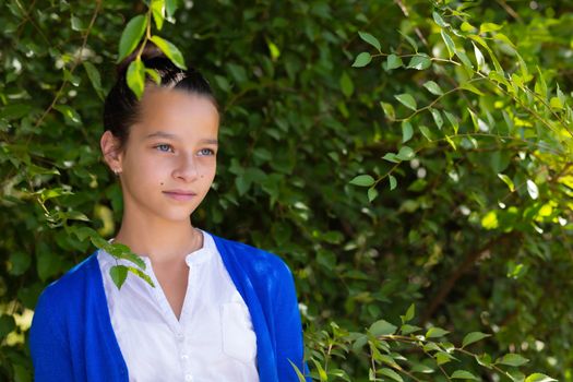 portrait of teen girl outdoors in the park