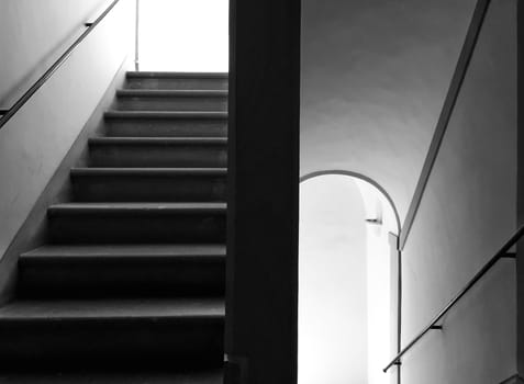 central view of a staircase in black and white