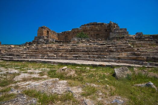 Pammukale, Turkey - July, 2015: photo of ancient city Hierapolis, near modern turkey city Denizli