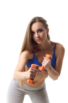 Concepts: healthy lifestyle, sport. Happy beautiful woman fitness trainer working out with small dumbbells isolated on white background