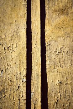 abstract background or texture vertical shadows on the ancient ocher wall