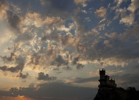 The old palace on a high mountain against the sky.