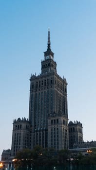 Warsaw, Poland. City center with Palace of Culture and Science, a landmark and symbol of Stalinism and communism, and modern sky scrapers.