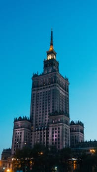 Warsaw, Poland. City center with Palace of Culture and Science, a landmark and symbol of Stalinism and communism, and modern sky scrapers.