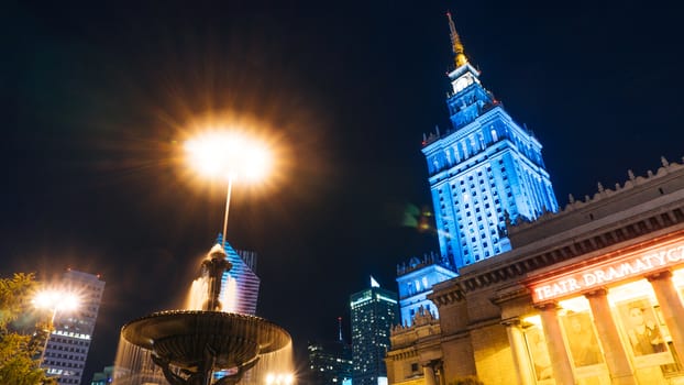 Warsaw, Poland. City center with Palace of Culture and Science, a landmark and symbol of Stalinism and communism, and modern sky scrapers.