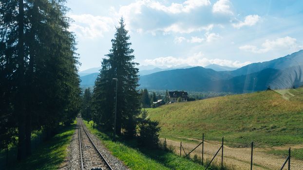 Railroad tracks for mountain lift on Gubalowka, Poland.