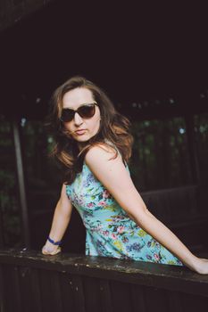 Portrait of romantic woman at fairy forest.