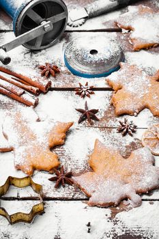 Homemade biscuits in the form of maple leaves covered with snow