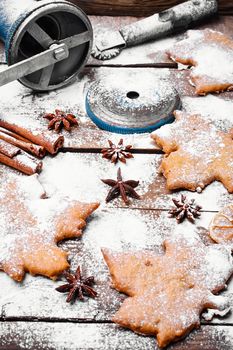 Homemade biscuits in the form of maple leaves covered with snow