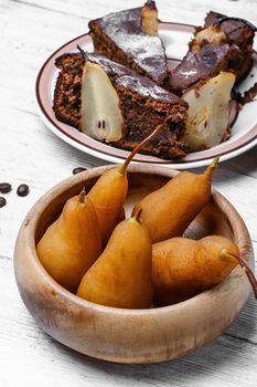 Sweet homemade tart with pears on light background