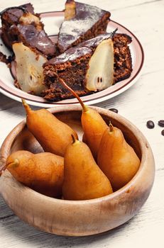 Sweet homemade cake with pears on a light background
