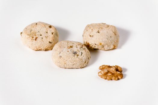 Cavallucci, typical Italian cookies with walnut on white background