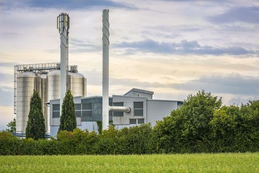 Image with a german energy factory that produces heat and electricity from natural resources.