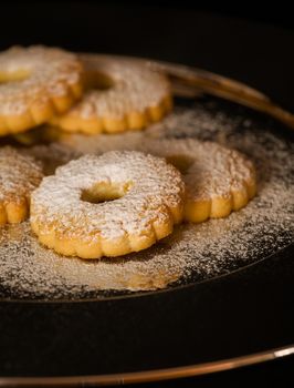 Five biscuits canestrelli on a plate of steel