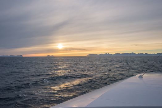 Ferry ride at sunset on the way to Lofoten, Norway.