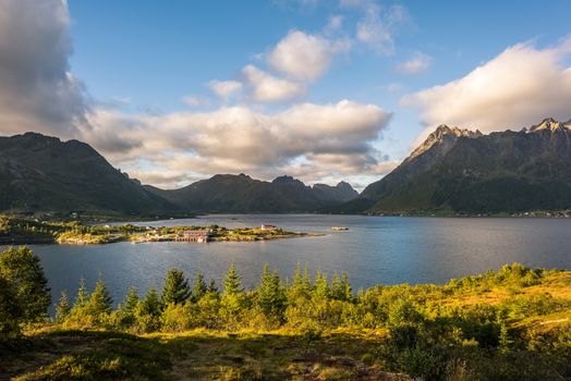 Colorful summer landscape with sharp mountain peaks in Norway.