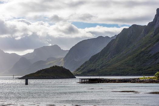 Dramatic summer landscape with sharp mountain peaks in Norway.
