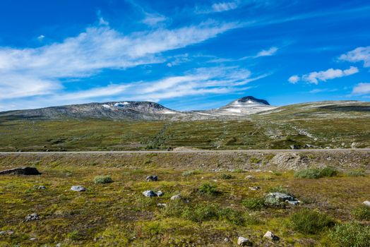 Vivid summer landscape with mountain and road at Saltfjellet, Norway.