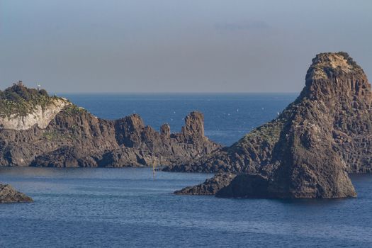 View of  sicilian rocks on sea "Faraglioni"