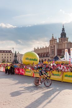 KRAKOW, POLAND - AUGUST 9: Cyclist at the final stage of 71th Tour de Pologne on August 9, 2014 in Krakow. Tour de Pologne is the biggest cycling event in Eastern Europe.